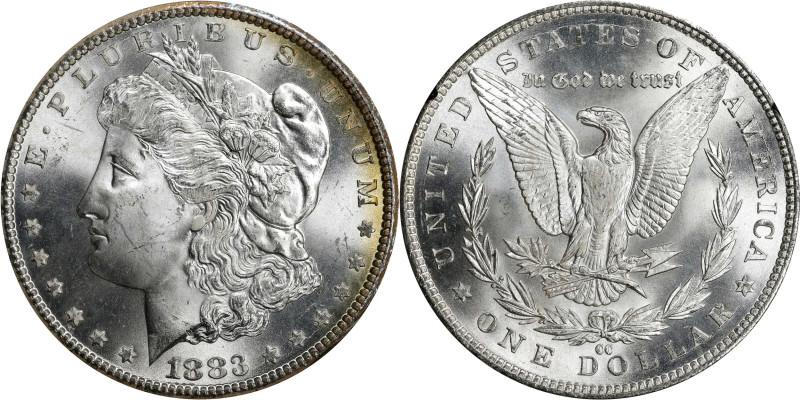 1883-CC GSA Morgan Silver Dollar. MS-65 (NGC).
The original box and card are no...