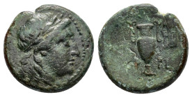 AEOLIS. Myrina.(2nd-1st centuries BC).Ae.

Obv : Laureate head of Apollo right.

Rev : MY - PI.
Amphora, lyre in right field.

Weight : 4.5 gr
Diamete...