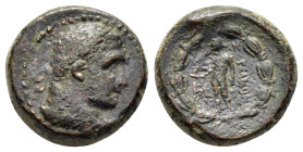 LYDIA. Sardes.(2nd-1st centuries BC).Ae.

Obv : Laureate head of Herakles right.

Rev : ΣAPΔIANΩN.
Apollo standing left, holding raven and branch; mon...