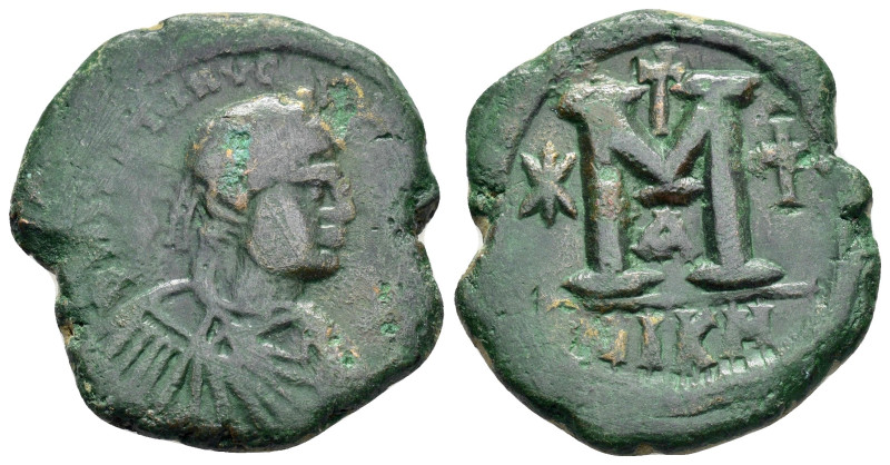 JUSTINIAN I.(527-565).Nicomedia.Follis.

Weight : 16.1 gr
Diameter : 29 mm