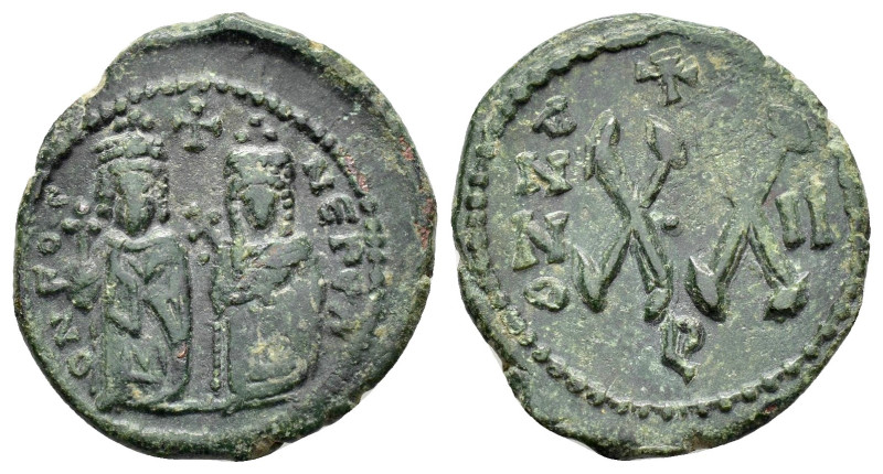 PHOCAS.(602-610). Theoupolis (Antioch).Half Follis.

Weight : 5.2 gr
Diameter : ...