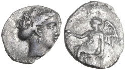 Greek Italy. Bruttium, Terina. AR Triobol, c. 400-356 BC. Obv. Head of nymph right. Rev. Nike seated left, holding bird. HN Italy 2632. AR. 0.90 g. 12...