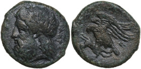 Sicily. Akragas. AE 19 mm. c. 338-317 BC. Obv. ΑΚΡΑΓΑ. Laureate head of Zeus. Rev. Eagle standing left, tearing at hare in talons. HGC 2 164; CNS I 11...