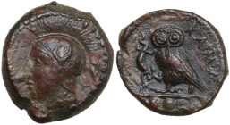 Sicily. Kamarina. AE Tetras or Trionkion, c. 410-405 BC. Obv. Head of Athena in Attic helmet left. Rev. Owl standing left, head facing, clutching liza...