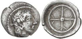 Sicily. Syracuse. AR Obol. Local imitation (?). Obv. Diademed head of Arethusa right. Rev. Wheel of four spokes. Dotted border. Cf. HGC 2 1371; Boehri...