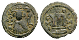 "Umayyad Caliphate, Umayyad Copper Coinage. temp. 'Abd al-Malik. 65-86/685-705. AE fals (20.1 mm, 3.74 g, 6 h). Hims (Emesa) mint, ca. 685-690s. Crown...