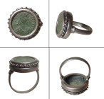 "A nice silver ring with a Roman bronze coin. The coin was issued under the emperor of Arcadius, A.D. 383 - 408. , with an attractive portrait. The co...
