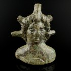 Roman Bust of Sol
2nd-3rd century CE
Bronze, 38 mm
Applique showing the youthful God with five rays around his head. 
Very fine condition.
Ex. Co...