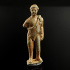 Roman Bronze Statuette
1st-3rd century CE
Bronze, 44 mm
Massive cast statuette of a nude male, an animal skin hanging around his shoulder.
Very fi...