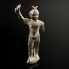 Roman Eros Statuette
1st-3rd century CE
Silver, 40 mm, 10,06 g
Massive cast silver statuette of Eros(?), wearing knoted hairs and holding a torch. ...