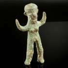 Bronze Age Statuette
2nd millenium BCE
Bronze, 87 mm
Standing nude figure with raised arms, male and female attributes. Rare!
Very fine condition....