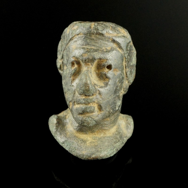 Roman Female Head
1st-3rd century CE
Bronze, 26 mm
Massive cast. Expressional...
