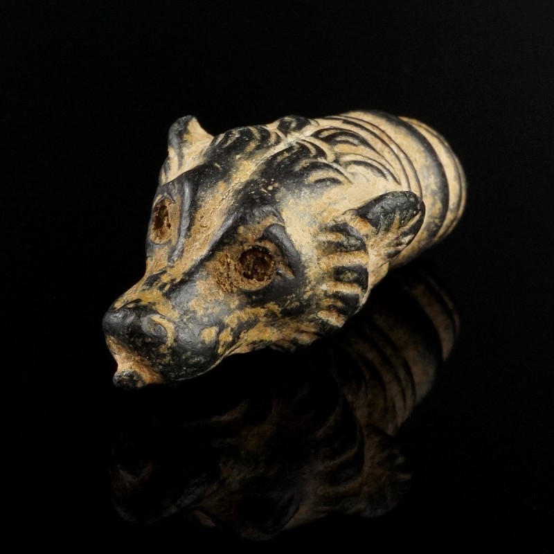 Roman/Byzantine Dog's Head
2nd-8th century CE
Bronze, 36 mm
Massiv cast with ...