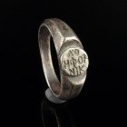 Byzantine Silver Ring
8th-12th century CE
Silver, 19 mm; 16 mm internal dm
Intact and wearable. Three-lined inscription. ΛΟ/ΗΦΟΡ/ΝIK
Very fine con...
