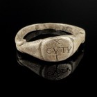 Byzantine Silver Ring
8th-12th century CE
Silver, 20 mm; 16 mm internal dm
Intact and wearable. Three-lined inscription. X/EVTV/I
Very fine condit...