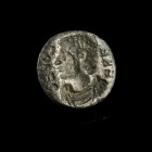 Byzantine Signet Ring Plate
6th-10th century CE
Silver, 9 mm
Showing a male bust surrounded by a greek inscription.
Very fine condition.
Ex. Coll...