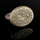 Medieval Signet Ring
13th-15th century CE
Silver, 23 mm; 18 mm internal dm
Intact and wearable. Engraved with a greek inscription around a swan. 
...