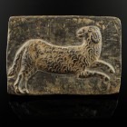 Roman/Byzantine Weight/Votiv
2nd-8th century CE
Bronze, 77 mm, 174 g
Massive cast. Possibly a weight or votiv plaque showing a running ram on both ...