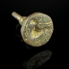 Byzantine Gilded Seal Stamp
8th-12th century CE
Bronze, 18 mm
Intact stamp showing a bird holding a wreath in his beak. 
Very fine conditon. Remai...
