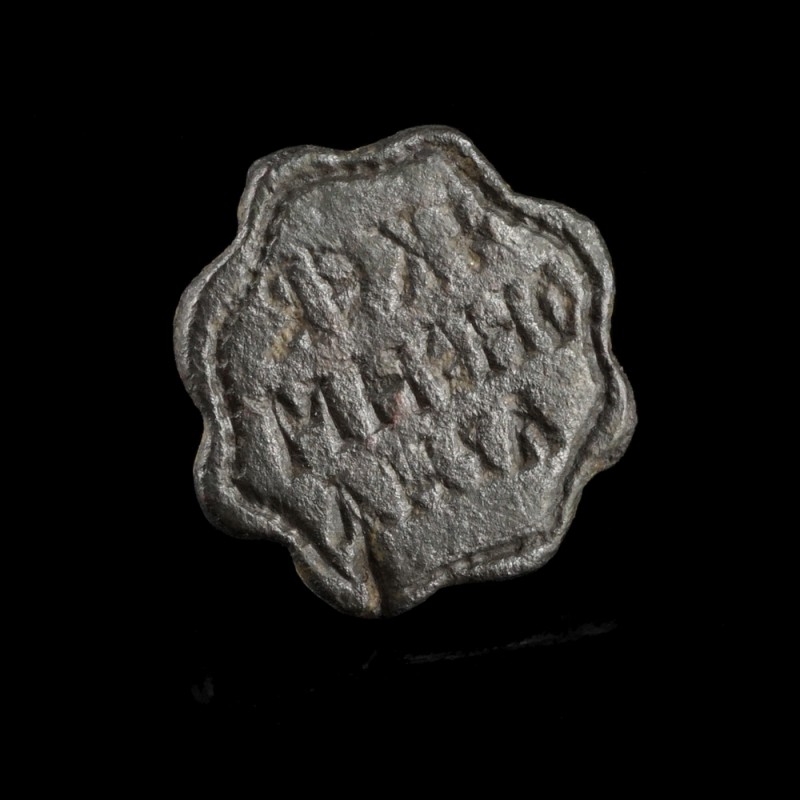 Byzantine Seal Stamp
10th-12th century CE
Bronze, 16 mm
Three-lined greek ins...