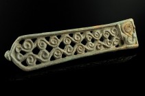 Avar Strap-End
8th century CE
Bronze, 96 mm
Openwork cast showing an ornament.
Excellent condition.
Ex. Coll. A.L., acquired at the european art ...