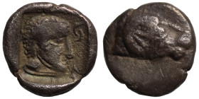 CARIA, Uncertain. Circa 400-340 BC. AR Hemiobol (silver, 0.41 g, 7 mm). Head of ram right. Rev. Head of male right; Carian Z-A to right; all within in...