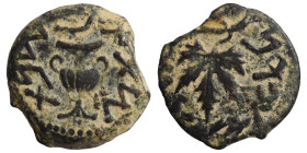 JUDAEA. First Jewish War, 66-70 AD. Prutah (bronze, 2.69 g, 17 mm), year 2 = 67/8. Amphora. Rev. Vine leaf on branch with tendril. Hendin 1360; Meshor...