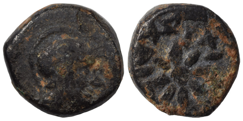 Greek. Ae (bronze, 0.90 g, 9 mm). Helmeted head right. Rev. Star (?), traces of ...