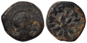 Greek. Ae (bronze, 0.90 g, 9 mm). Helmeted head right. Rev. Star (?), traces of legend around. Nearly very fine.