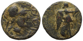 Greek. Ae (bronze, 1.48 g, 13 mm). Helmeted head of Athena right. Rev. Nike/Victory walking right. Nearly very fine.