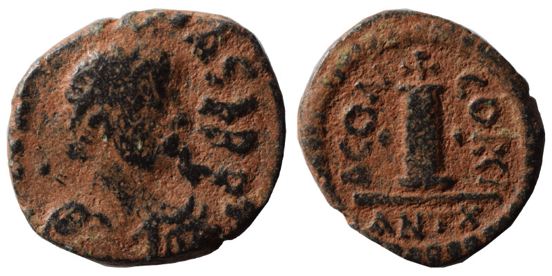 Justin I, 518-527. Dekanummium (bronze, 4.53 g, 19 mm), Antioch. Diademed, drape...