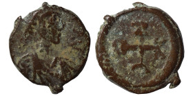 Justin I, 518-527. Pentanummium (bronze, 0.88 g, 9 mm), Antioch. D N IVSTINVS P AVG Pearl-diademed, draped and cuirassed bust to right. Rev. Monogram....