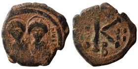 Justin II, with Sophia, 565-578. Half Follis (bronze, 6.12 g, 22 mm), Constantinople. Justin, holding globus cruciger, and Sophia, holding cruciform s...