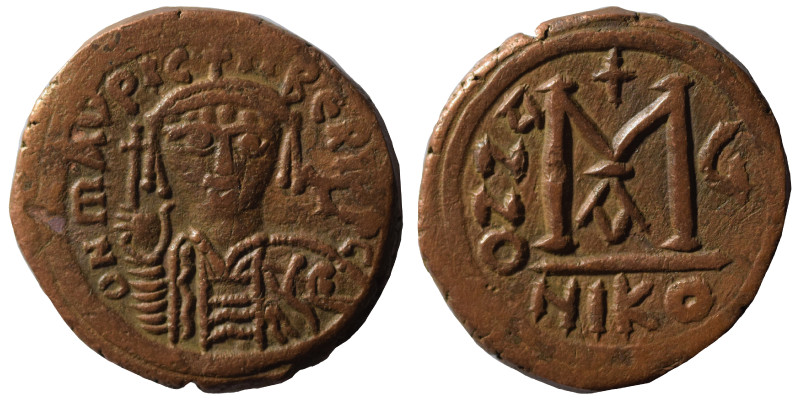 Maurice Tiberius, 582-602. Follis (bronze, 13.27 g, 30 mm), Nicomedia. Helmeted ...