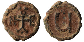 Maurice Tiberius, 582-602. Pentanummium (bronze, 1.64 g, 14 mm), Theoupolis (Antioch). Monogram 18 of Maurice Tiberius. Rev. Large Ч; above, cross. DO...
