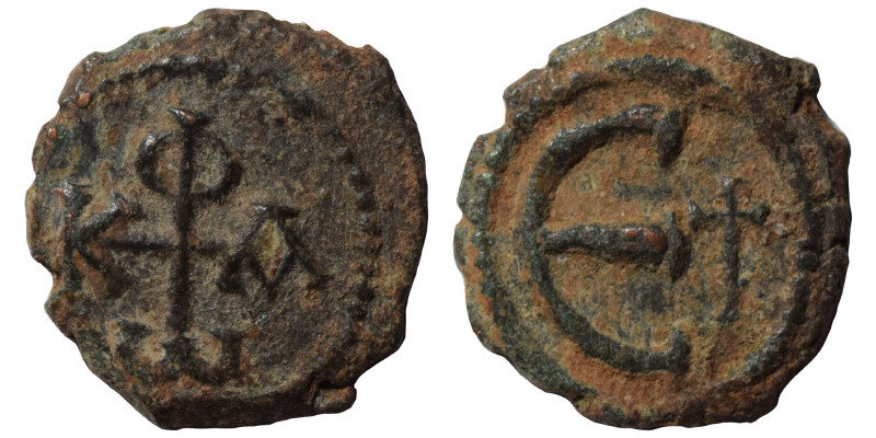 Phocas, 602-610. Pentanummium (bronze, 1.47 g, 14 mm), Antioch. Monogram of Phoc...