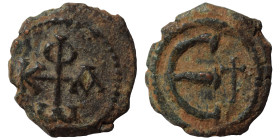 Phocas, 602-610. Pentanummium (bronze, 1.47 g, 14 mm), Antioch. Monogram of Phocas. Rev. Large Є; to right, cross. DOC -; MIB N89; SB 676A. Very fine....