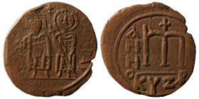 Phocas, with Leontia, 602-610. Follis (bronze, 9.42 g, 30 mm), Cyzicus. Phocas, on the left, standing facing, holding globus cruciger in his right han...