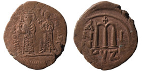 Phocas, with Leontia, 602-610. Follis (bronze, 12.64 g, 32 mm), Cyzicus. Phocas, on the left, standing facing, holding globus cruciger in his right ha...