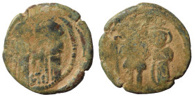 Byzantine. Ae (bronze, 6.41 g, 24 mm). Two figures standing. Rev. Two figures standing. Fine.