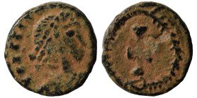 Uncertain. 5/6th century (?). Nummus (bronze, 0.32 g, 10 mm). Diademed head right. Rev. Cross within wreath. Very fine.