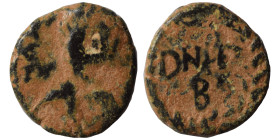 OSTROGOTHS. Baduila, 541-552. Nummus (bronze, 0.74 g, 10 mm), Ticinum. Pearl-diademed, draped and cuirassed bust right. Rev. DN REX in field below, B....