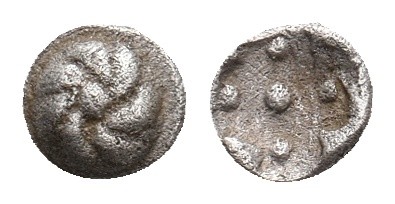 Ionia, Erythrai mint AR Tetartemorion. Circa 510-494 BC.
Obv. Rosette with cent...