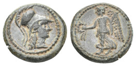 APULIA. Rubi. (Circa 300-225 BC). Ae.
Obv: Helmeted head of Athena right
Rev: Nike advancing left, holding wreath and palm frond.
HN Italy 816 corr...