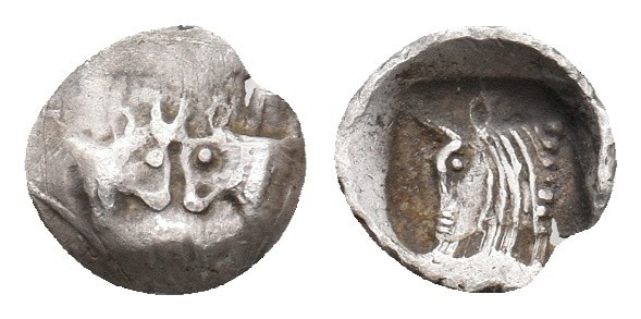 CARIA. Uncertain mint (Circa 450-400 BC). AR Tetartemorion.
Obv: Foreparts of t...