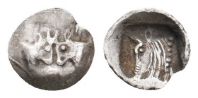 CARIA. Uncertain mint (Circa 450-400 BC). AR Tetartemorion.
Obv: Foreparts of two confronted bulls, with horns intertwined
Rev: Bull head left withi...