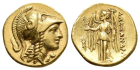 KINGS OF MACEDON. Alexander III 'the Great' (336-323 BC). GOLD Stater. Uncertain mint in Macedon.
Obv: Head of Athena right, wearing Corinthian helme...