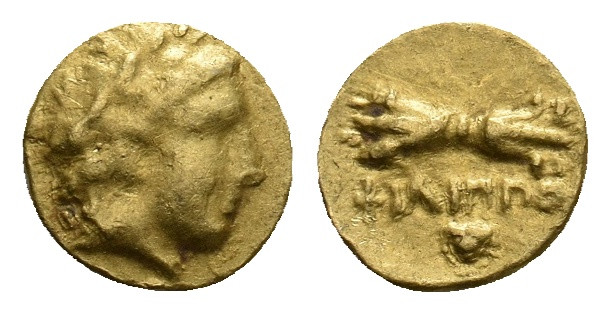 KINGS OF MACEDON. Philip II (359-336 BC). GOLD 1/12 Stater. Pella.
Obv: Laureat...
