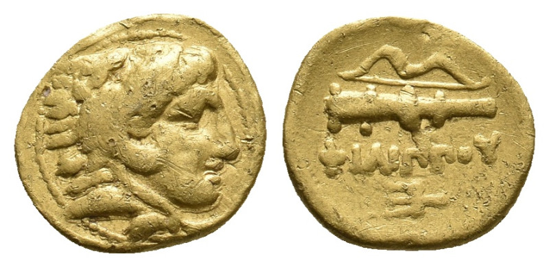 KINGS OF MACEDON. Philip II (359-336 BC). GOLD 1/4 Stater. Pella.
Obv: Head of ...
