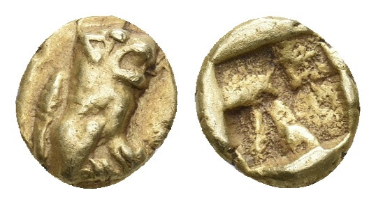 IONIA. Uncertain (Circa 550-500 BC). EL 1/24 Stater.
Obv: Lion seated right.
R...
